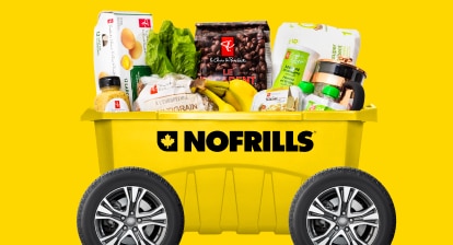 A yellow No Frills shopping bin on wheels filled with groceries.