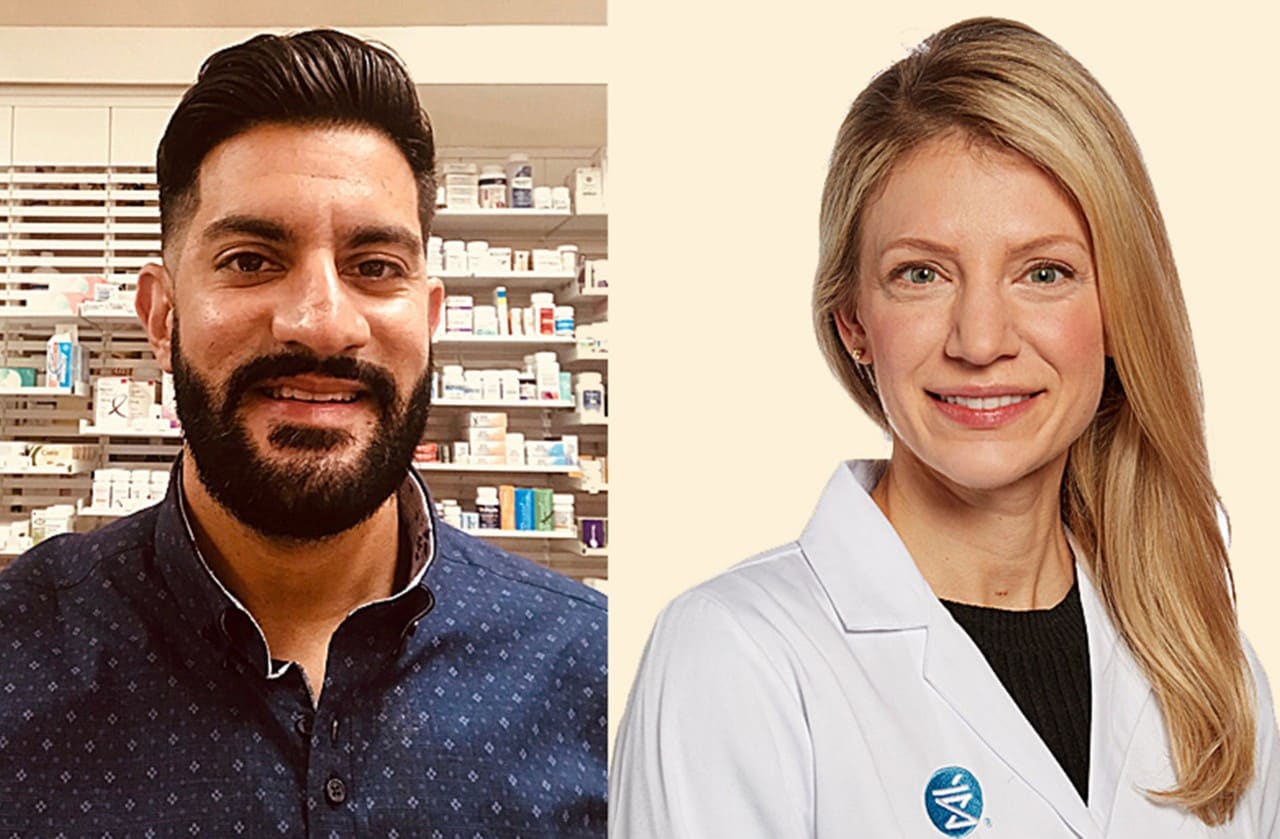 Two Shoppers Drug Mart pharmacists, a man and a woman, facing the camera 