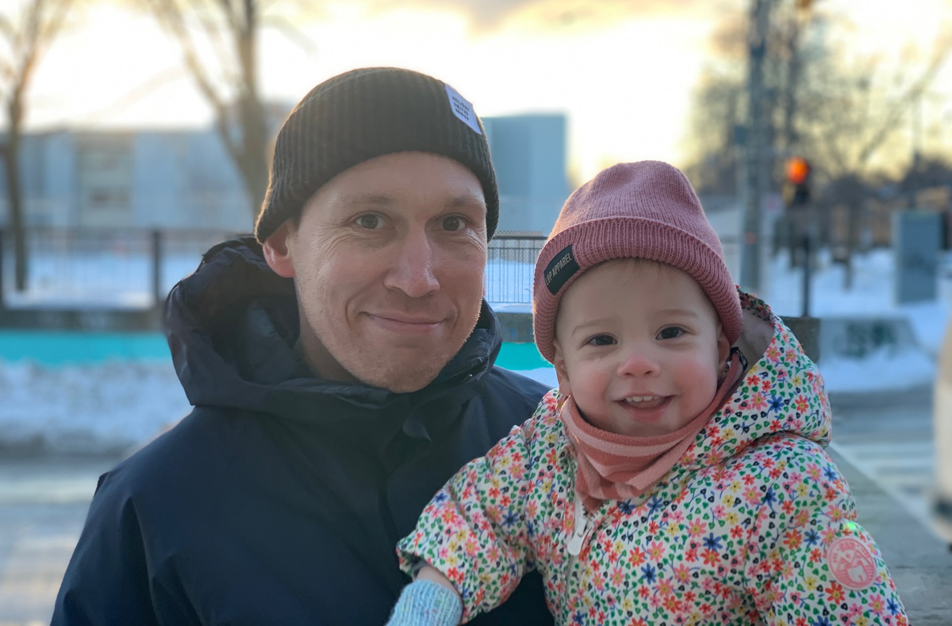 Chris stands with his daughter Anna. 