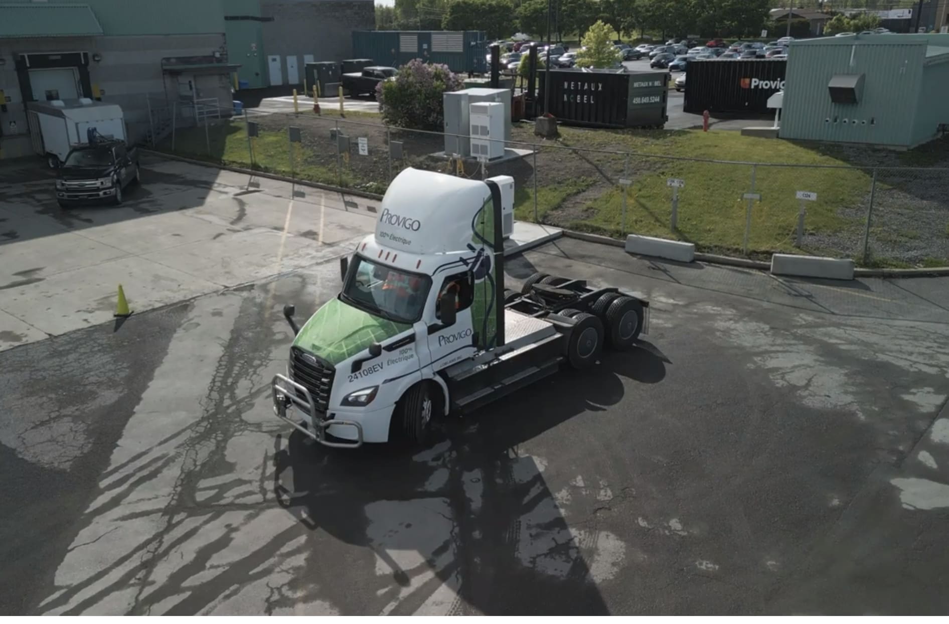 A picture of an electric truck that says “Provigo” on the front. 