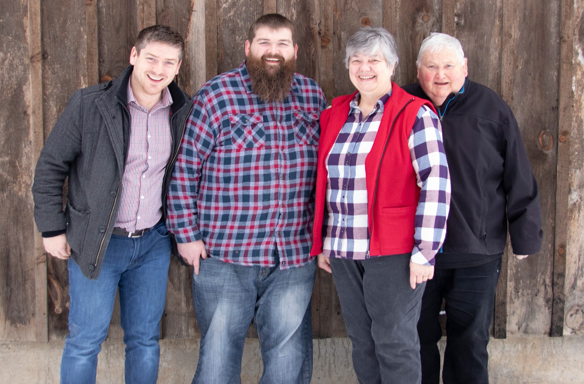 Chad Jakeman, his brother and parents are all smiles on the family farm, awaiting another great season ahead.  