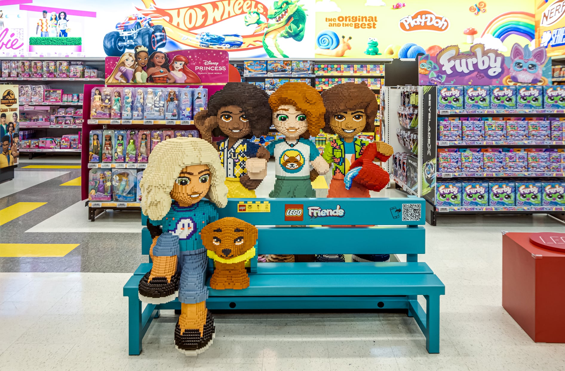 Image of Lego Friends structure sitting on a bench in the middle of the newly renovated toys section of the Real Canadian Superstore.