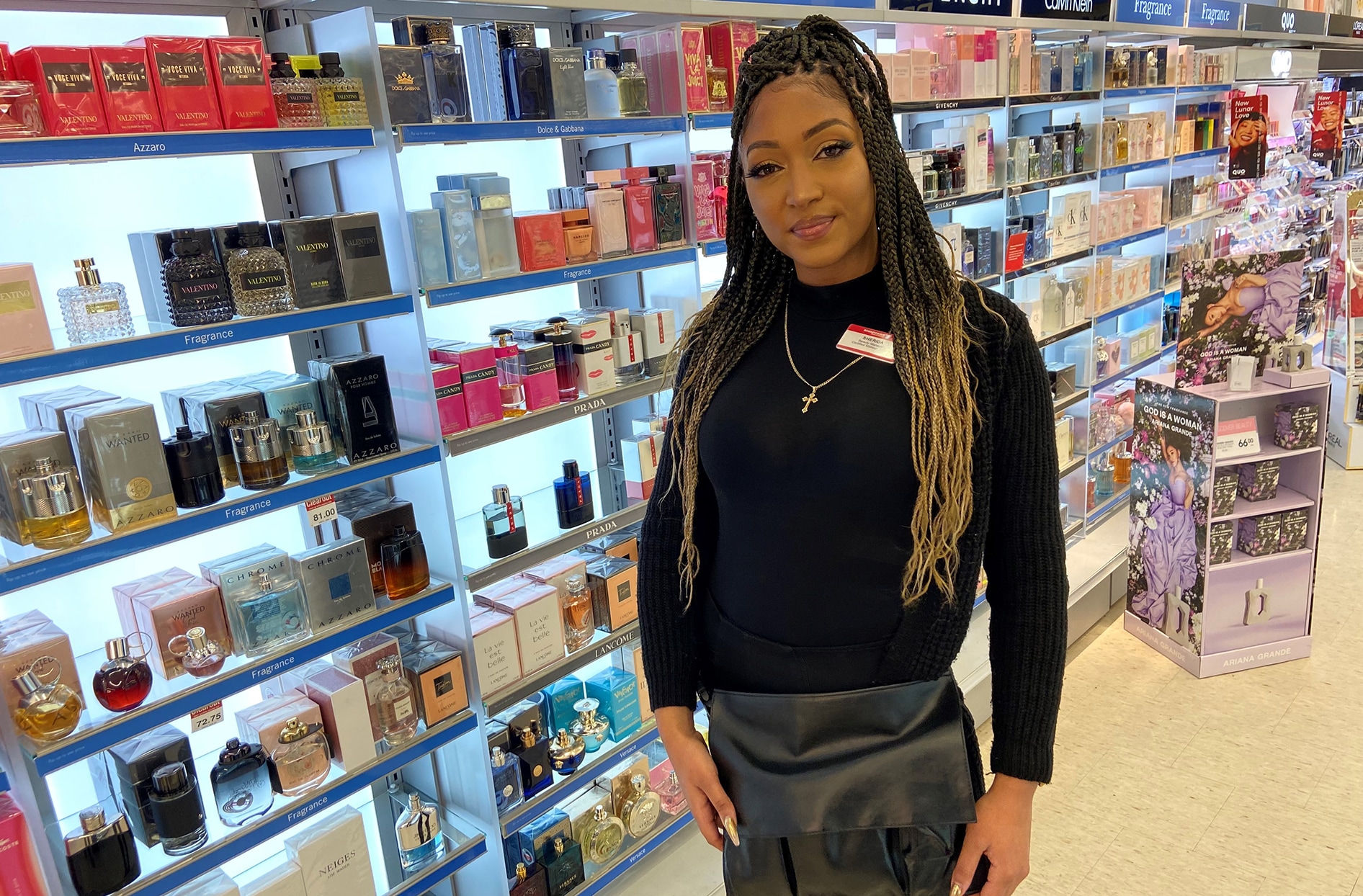 Sherida stands inside her Shoppers Drug Mart store 