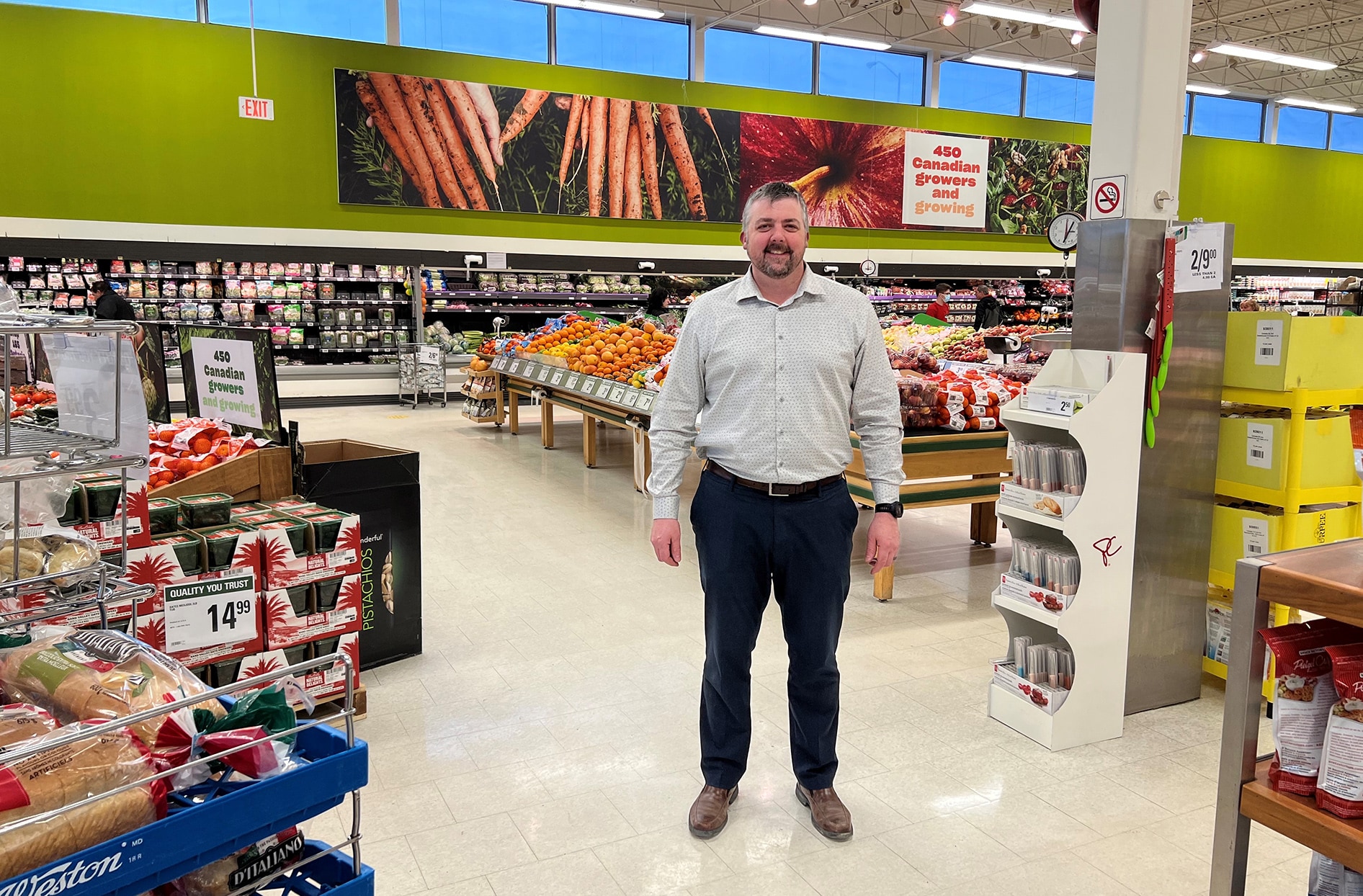 Stuart stands in the centre of his store’s floor