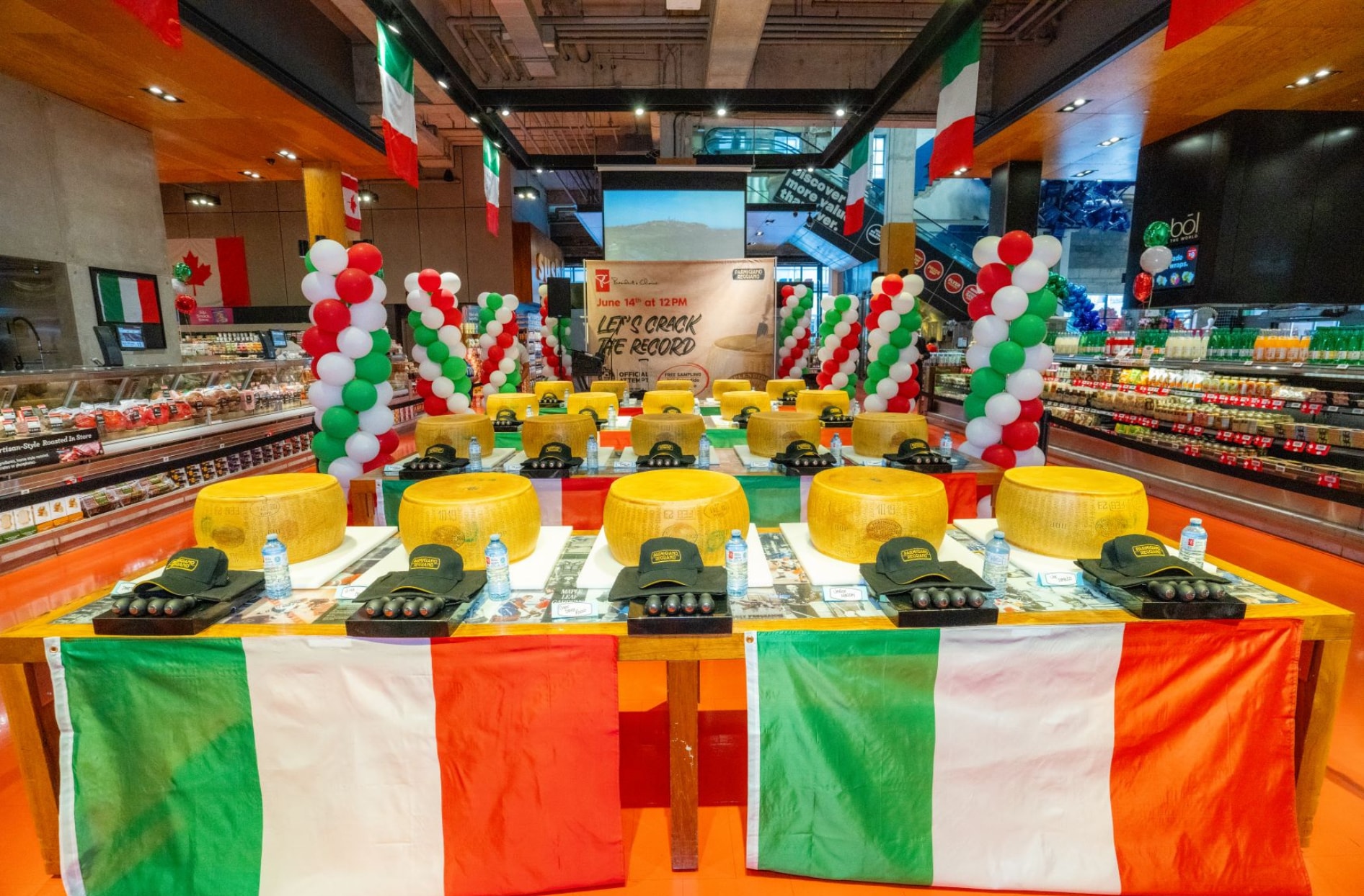 A photo of the parm wheels lined up in a row on a table.