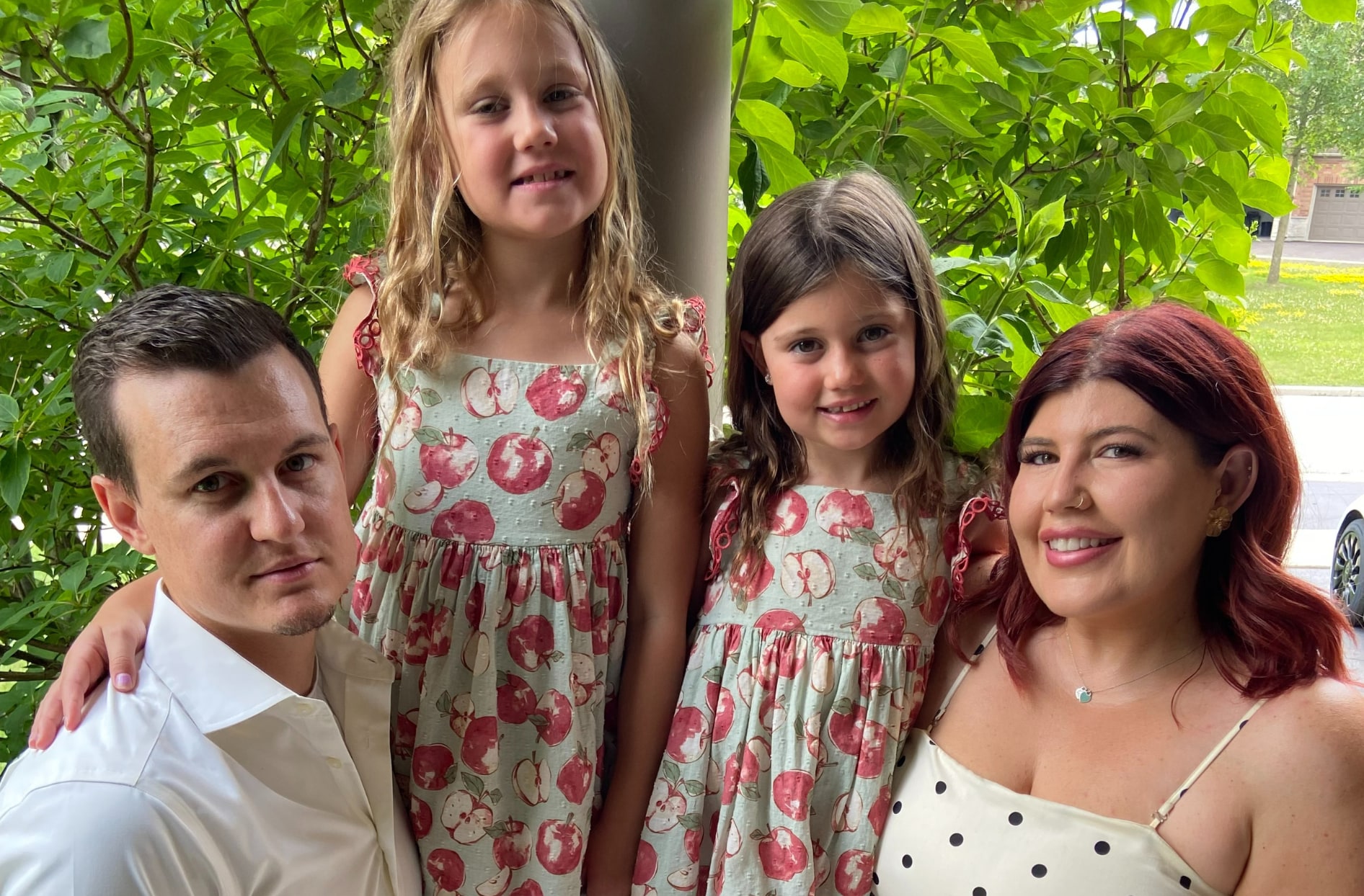 A family photo of Maddison and Couper with their two daugthers. 