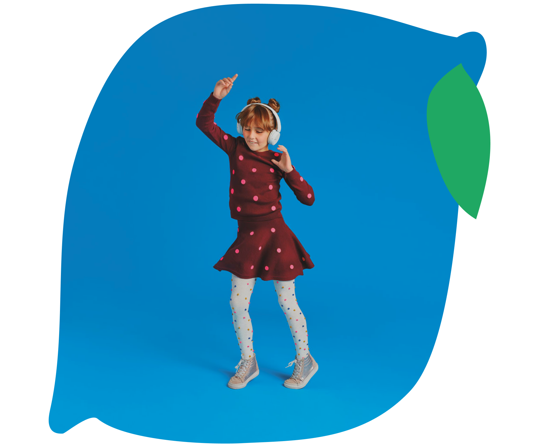 Young girl with headphones dancing