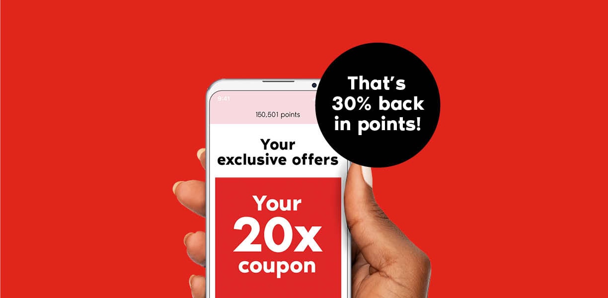 A hand holds a mobile phone that reads “Your exclusive offers. Your 20x coupon.” A circle reads “That’s 30% back in points!”