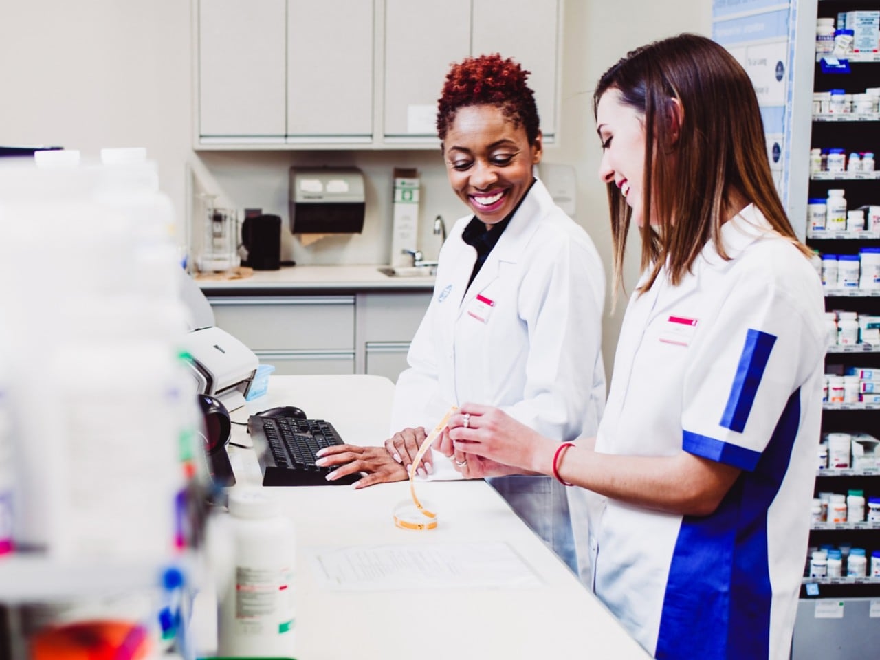 Two women working in a pharmacy